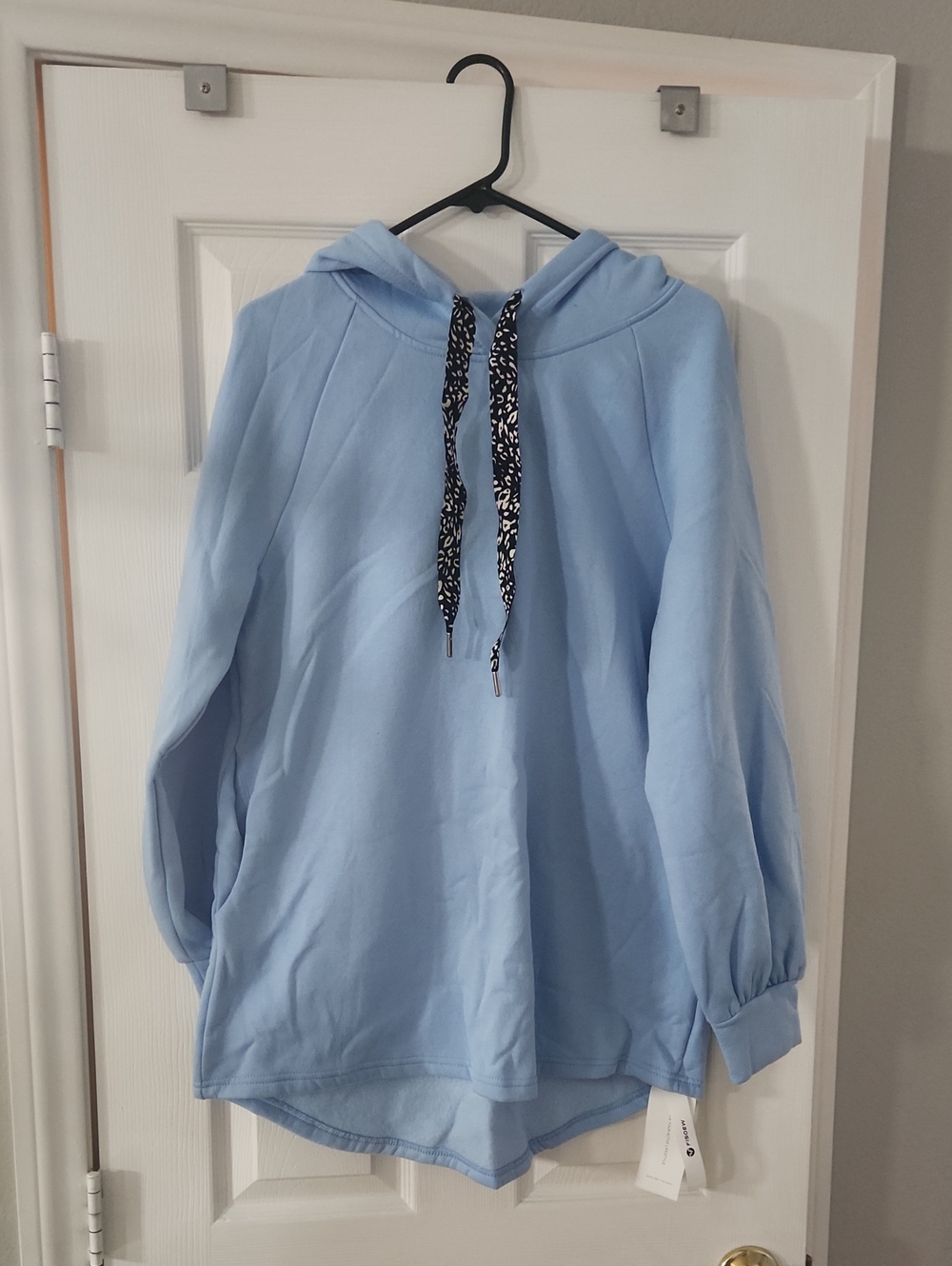 Light Blue Hooded Pullover Sweatshirt with Patterned Drawstrings